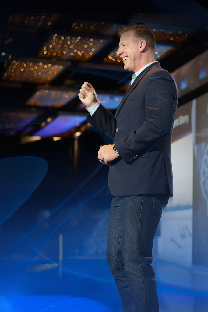 Jeff Bloomfield delivering a conference keynote on stage