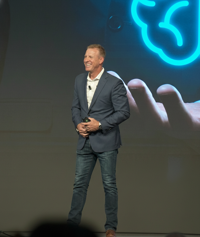 Jeff Bloomfield delivering a keynote on AI and human behavior