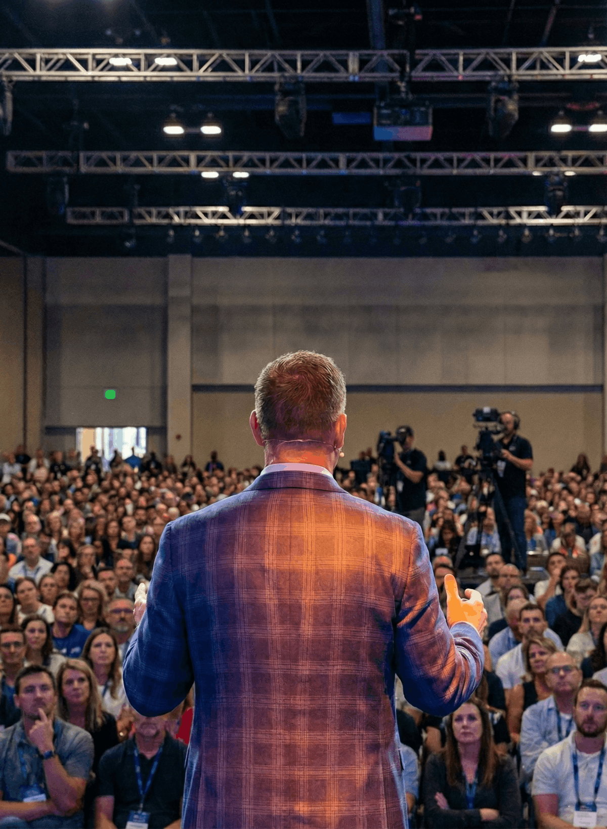 Jeff Bloomfield delivering a conference keynote on stage